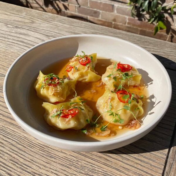 Plate with dumplings and chilli